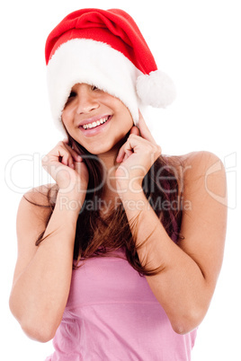 beautiful young women embrassing wearing santa's hat