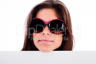 closeup of beautiful young women showing blank board stright view head