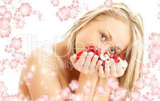 lovely blond in spa with red and white petals and flowers #2