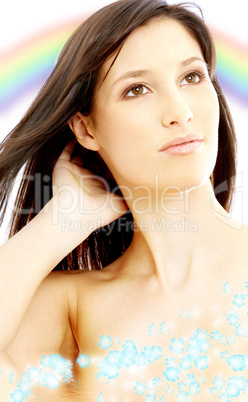 rainbow brunette in water with flowers