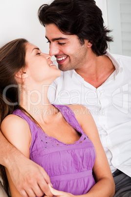 romantic young couple kissing eachother