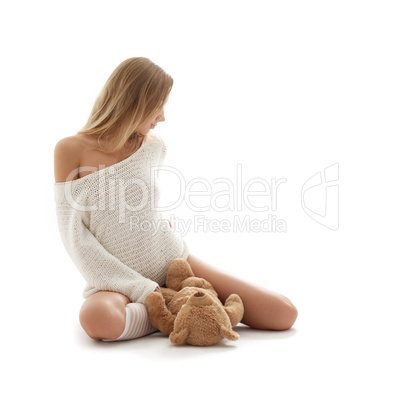 lovely blond in white sweater with teddy bear