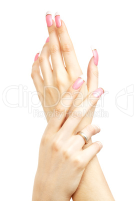 two hands with pink acrylic nails