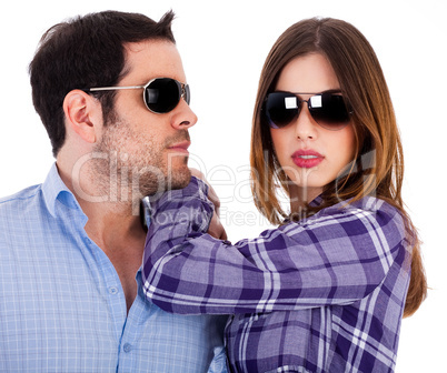 Stylish man and women wearing sunglasses