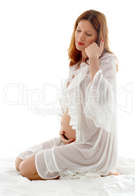 pregnant redhead in transparent sleepwear