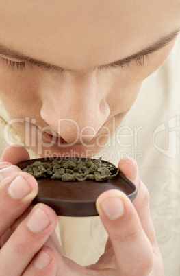 tea ceremony master smelling green tea