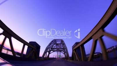 Traveling over the West End Bridge at dusk in Pittsburgh PA.  Fisheye lens.