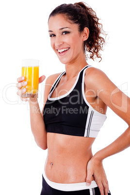 fitness girl having fresh juice in hand
