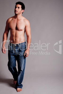 Topless Masculine man looking the right corner