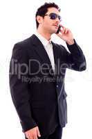 Handsome young business man talking on phone