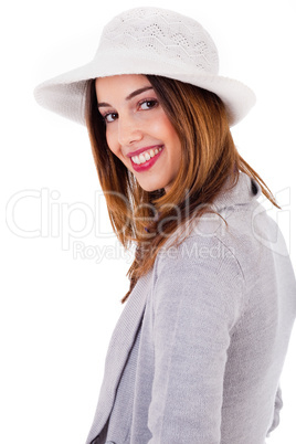 Side pose of a young model smiling