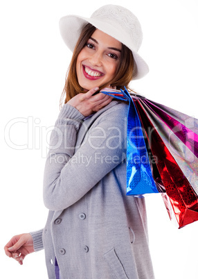 Beautiful young women holding her shopping bags