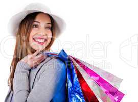 Portrait of young beautiful model carrying her shopping bags