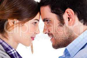 Beautiful couple smiling and facing each other