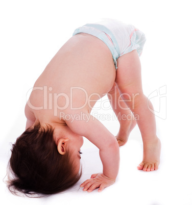 Baby bending down frontwards