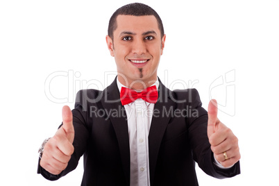 Half length of successful business man with thumbs up