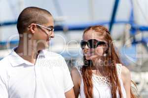 Couple looking each other at the harbour