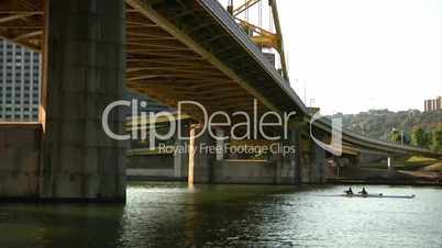 Crew team members prepare and race in the Row Regatta on the Allegheny River on Pittsburgh's north shore.