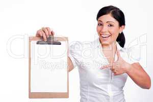 Lovely woman  Pointing blank Clip board on a white isolated background