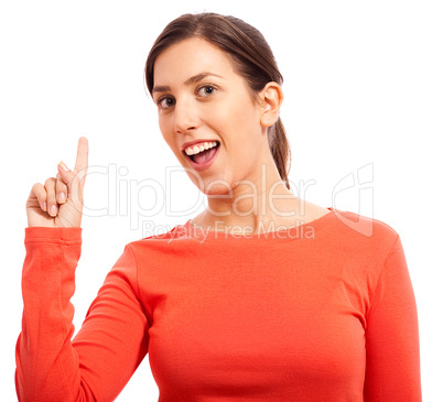 Portrait of a happy young woman pointing up