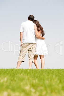 Rear view of romantic young couple standing