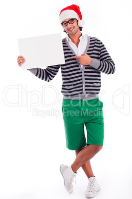 playful santa boy with a blank board playful santa boy with a blank board