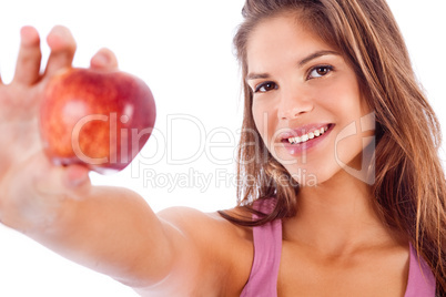 portrait of happy girl showing red apple