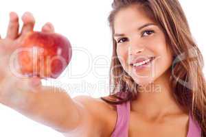 portrait of happy girl showing red apple
