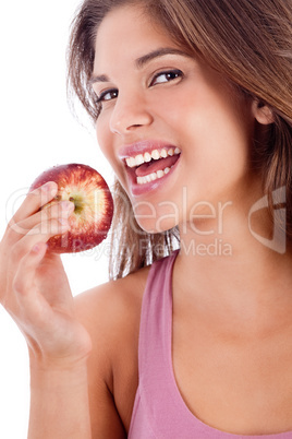 portrait of a healthy girl smiling with apple