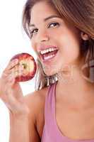 portrait of a healthy girl smiling with apple
