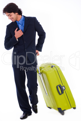 Corporate man looking down with the luggage