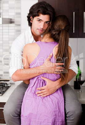 portrait of romantic young couple embracingeachother in causel wear
