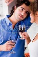 man looking his wife with wine