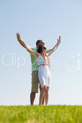 young Couple Stretching Their Hands Together