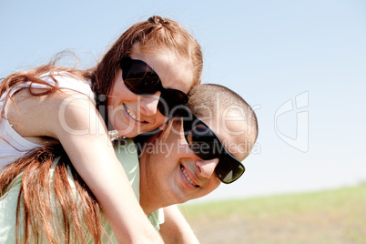 young Couple Piggybacking