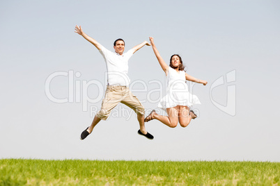 Young Couple Jumping