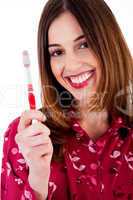 young lady posing with toothbrush