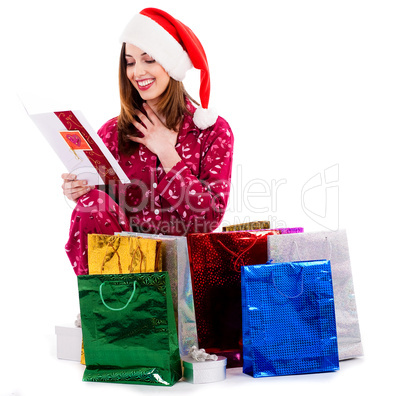 young lady with christmas card and gifts