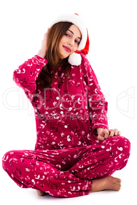 beautiful young lady wearing santa hat