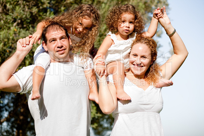 Happy family enjoying in the park