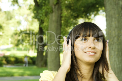 Young woman listening to music