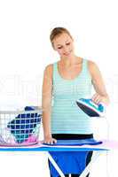 Bright woman ironing her clothes
