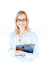 Confident businesswoman holding a clipboard