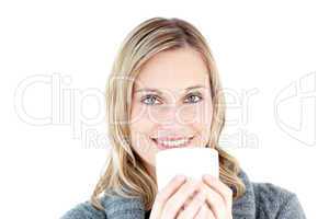 Beautiful woman enjoying a hot coffee standing