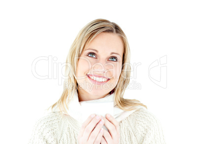 Smiling woman enjoying a hot coffee standing