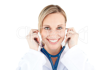 Confident female doctor holding a stethoscope smiling at the cam