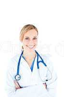 Assertive female doctor with folded arms smiling at the camera