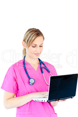 Charming female doctor holding a laptop