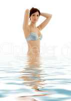 brunette in blue lingerie standing in water #3