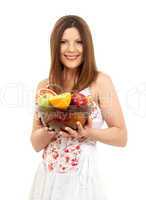 brunette girl holding cup of fruits